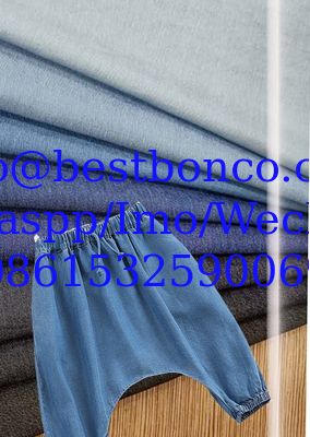 Denim de color directo de fábrica, no lavable, prendas infantiles de primavera y verano, tejido femenino no elástico, tencel similar al denim