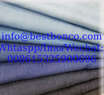 Denim de color directo de fábrica, no lavable, prendas infantiles de primavera y verano, tejido femenino no elástico, tencel similar al denim